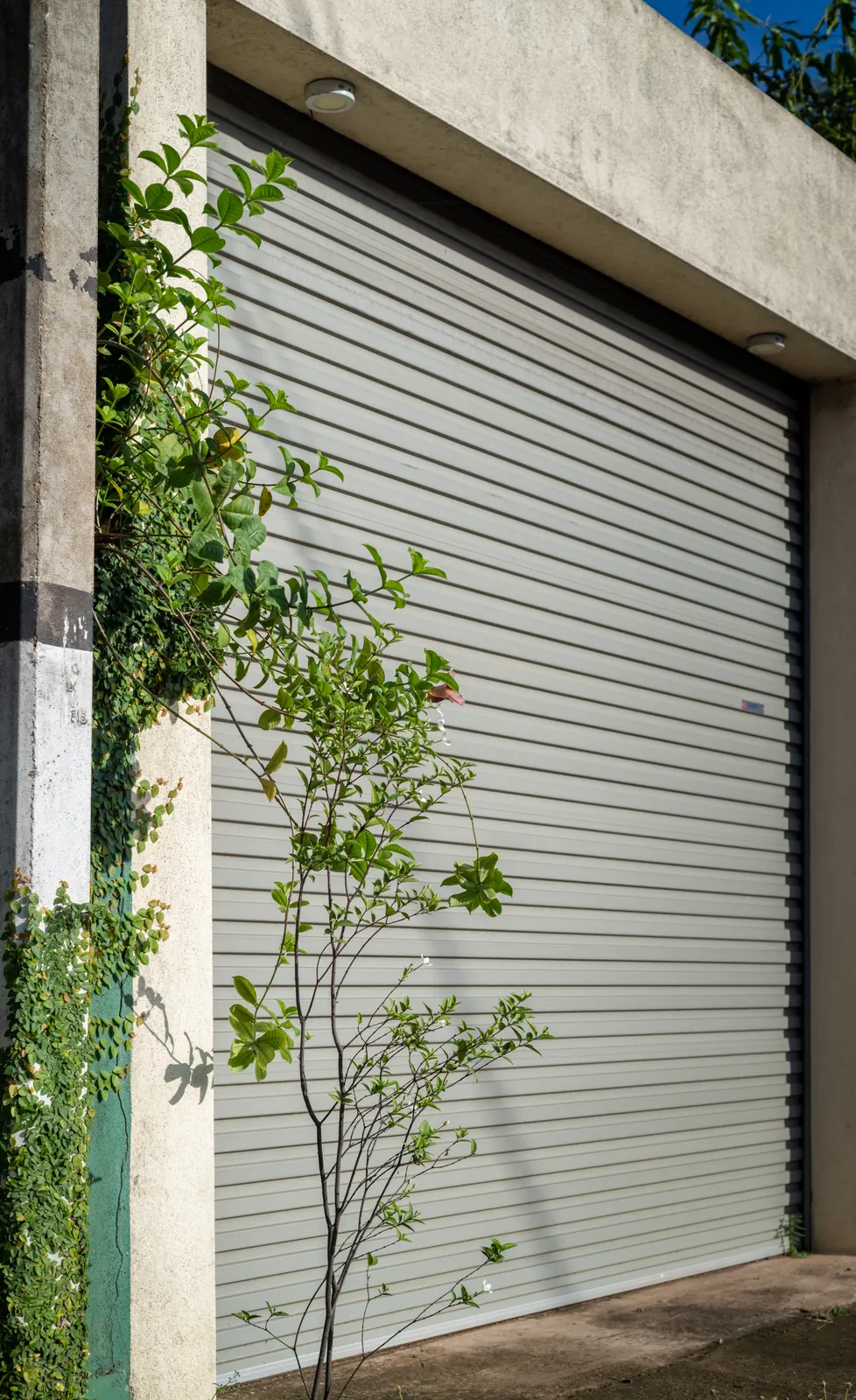 Garage door frame aluminum capping